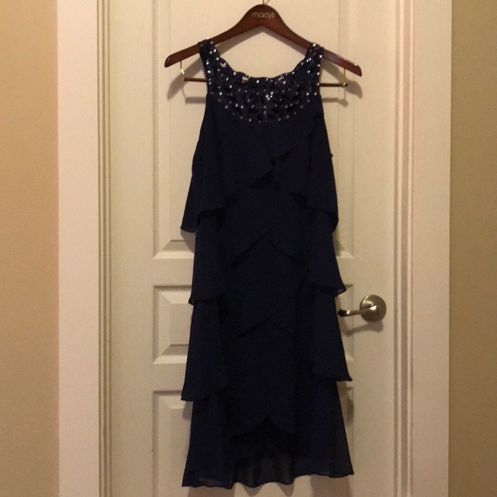 Navy blue tiered ruffle dress.